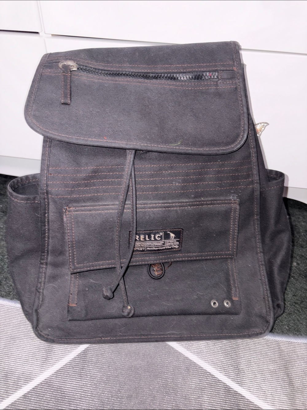 Relic Black Canvas Flap-Top Drawstring Backpack